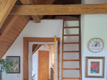 Wohnzimmer mit Kinderschlafplatz Dachspitze